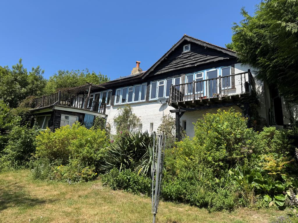 Lot: 117 - FREEHOLD DETACHED HOME WITH SIGNIFICANT STRUCTURAL DAMAGE - A View of Fleet House from the Rear Garden